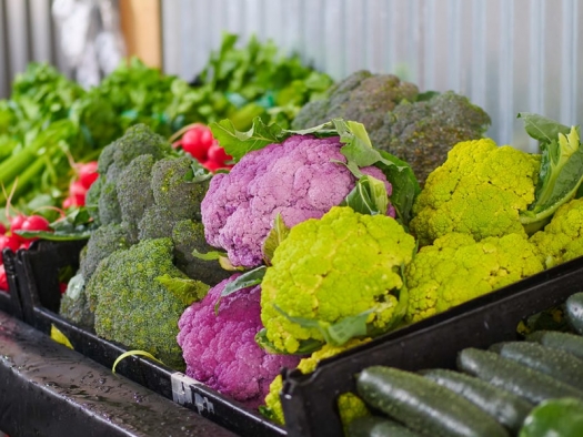 Broccoli, purple cauliflower, celery, radishes, cucumbers