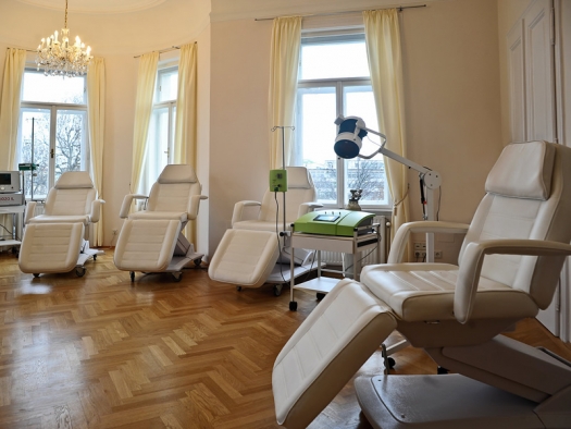 treatment chairs in a semicircle in bright cheerful room